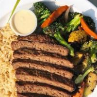 Bison Bowl · Lean ground bison with sautéed carrots, zucchini, and broccoli served over brown rice. Paire...
