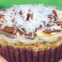 Ban Tella · Acai blended with strawberries, banana and almond milk topped with granola, banana, strawber...