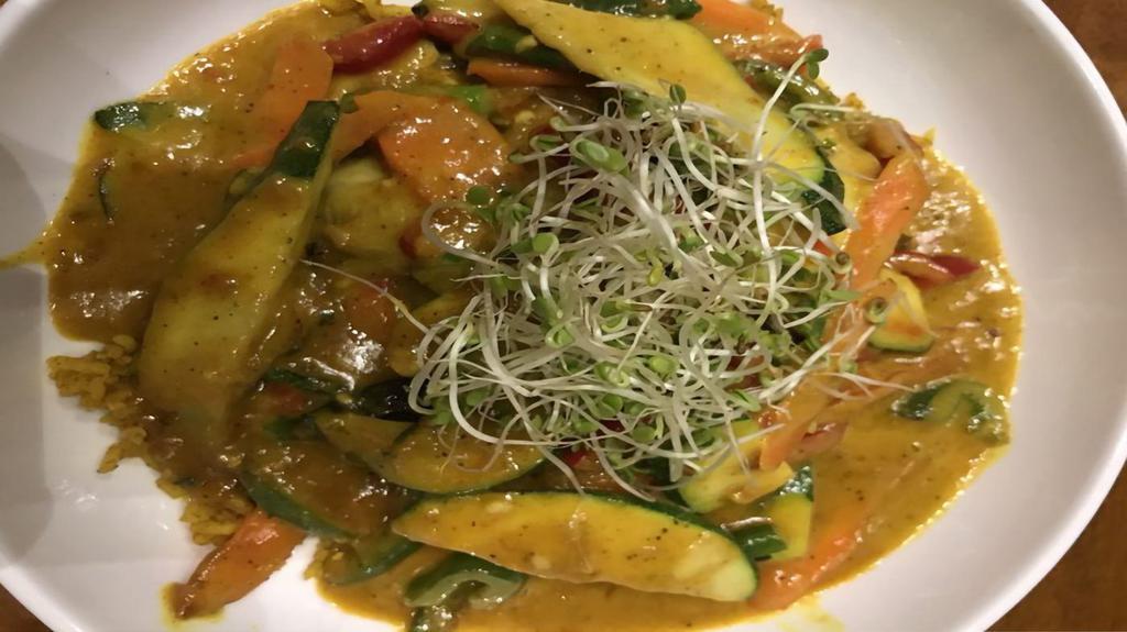 Frisco'S Vegetable Curry · Sautéed zucchini, yellow squash, red & green bell pepper, carrot, & onion in a creamy homemade curry sauce. Served on a bed of white rice.