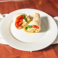 Fedora Chicken Wrap · Served with pesto, spinach, roasted peppers and fresh mozzarella.