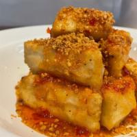 Crispy Tofu · Gluten free, vegetarian. Crispy tofu top with house blend sauce and roasted peanuts.