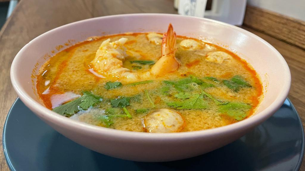 Tom Yum Soup · Gluten free, spicy. Hot and sour soup with shrimp, Thai herbs and chili.