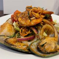 Hot Seafood Salad · Gluten free, spicy. Shrimp, calamari, mussels and scallop with spicy Thai seafood dressing.