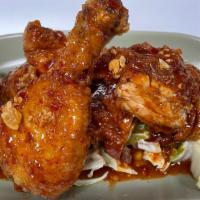 Hat Yai Chicken · Thai southern style overnight marinated fried chicken with sweet garlic & chili glaze served...