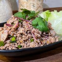 Laab Chicken · Gluten free. Spicy. Minced chicken dressed with thai northeastern style seasoning and herbs ...