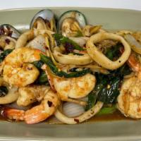 Seafood Spicy Basil · Spicy. Mixed seafood (scallops, mussels, shrimp, calamari) wok fired with spicy thai hot bas...