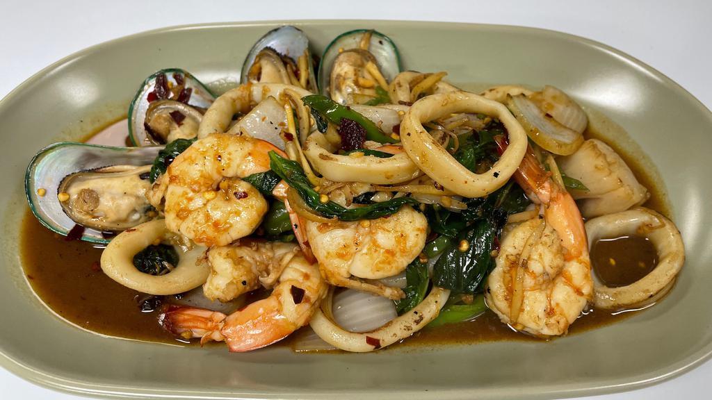 Seafood Spicy Basil · Spicy. Mixed seafood (scallops, mussels, shrimp, calamari) wok fired with spicy thai hot basil served with steamed jasmine rice.