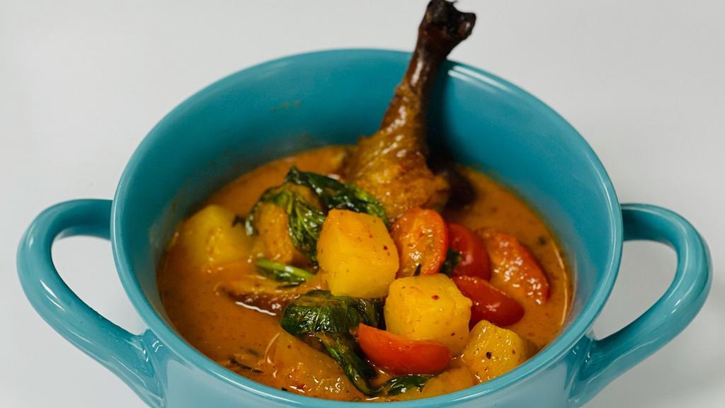 Duck Curry · Gluten free. Duck curry in panang curry with coconut milk served with steamed jasmine rice.