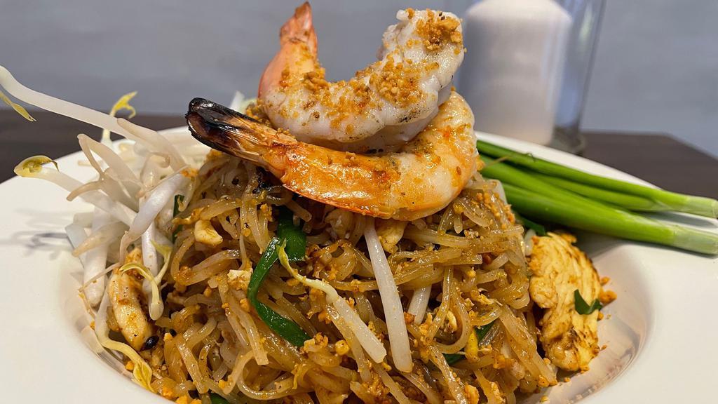 Pad Thai Classic · Gluten free, vegetarian. Traditional Thai noodle dish with rice noodles, pad thai tamarind sauce, egg, peanuts and vegetables.