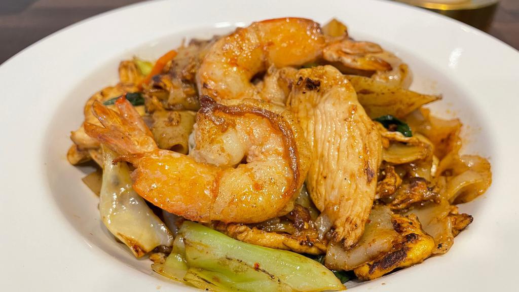 Drunken Noodles · Spicy. Fresh rice noodles with chicken, shrimp, egg, cabbage and carrot wok fried in spicy basil sauce.
