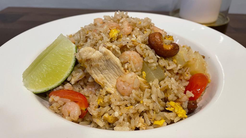 Pineapple Fried Rice · With chicken and rock shrimp, cashew nuts, pineapple, egg and vegetables.