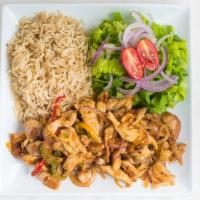 Chicken Over Rice · Shredded chicken sautéed with green peppers and onions served with rice and salad.