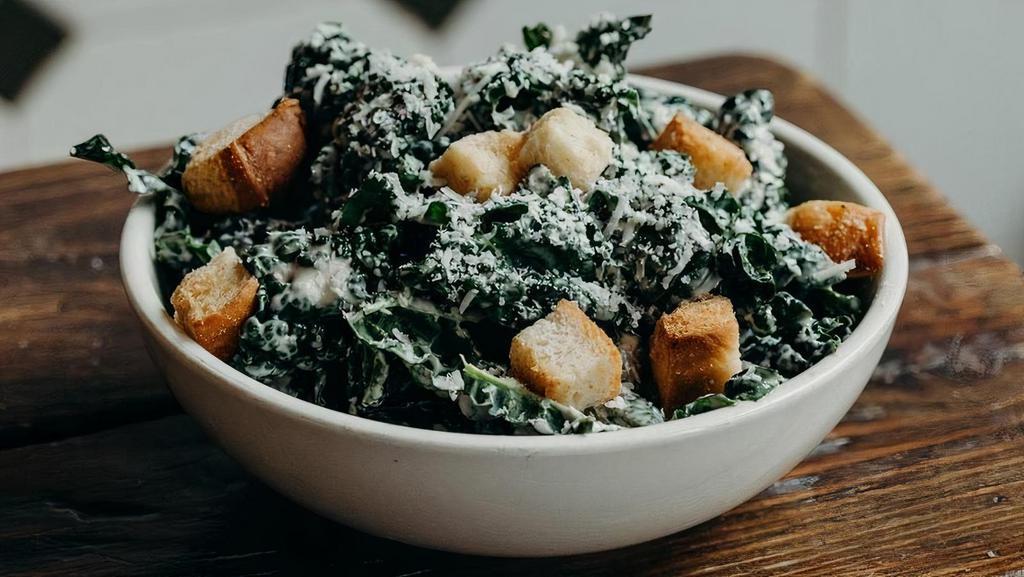 Kale Caesar Salad · Lacinato Kale, Croutons, Haus Caesar Dressing, Parmesan.
