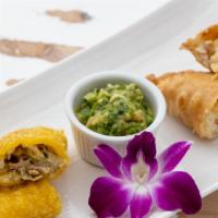 Empanadas · Two Colombian patties in the choice of beef, chicken, cheese or Hawaiian style (ham and pine...
