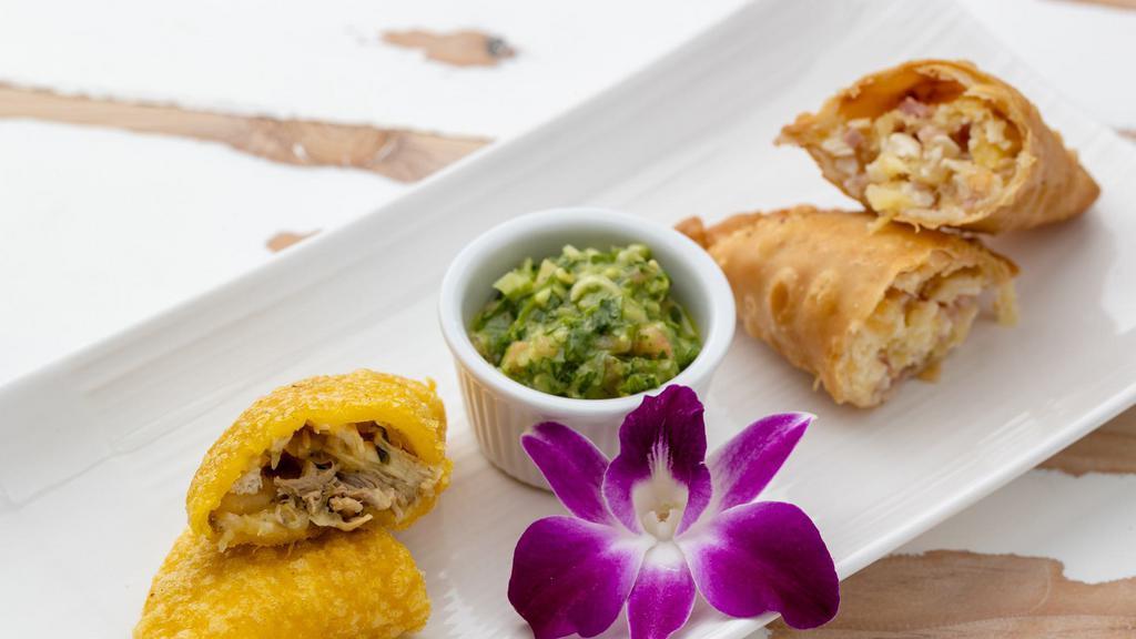 Empanadas · Two Colombian patties in the choice of beef, chicken, cheese or Hawaiian style (ham and pineapple)