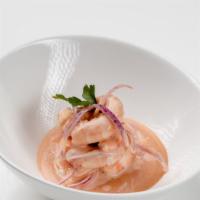 Shrimp Ceviche · A staple of Cali Shrimp dressed in lime juice, cilantro, mango and purple onions in a
homema...