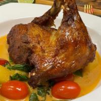 Duck Tropical Curry · Spicy. Crispy duck topped with red curry, coconut milk, bell pepper, pineapple, basil and to...