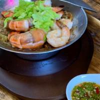 Goong Ob Woon Sen · Glass noodles with jumbo shrimp, napa, onion, celery, ginger, garlic and black pepper in ses...