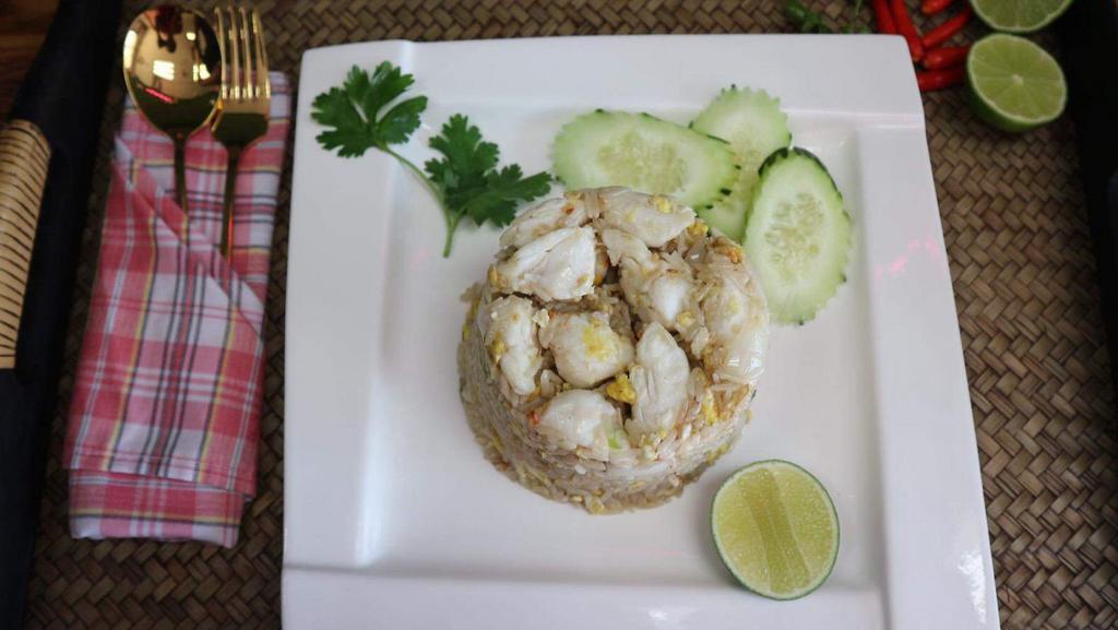 Crab Fried Rice · Fried rice with jumbo white crab meat, egg and scallions.