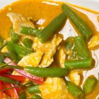 Panang Curry · Spicy. Thai style coconut milk panang curry with peanut, string bean, bell pepper and lime l...