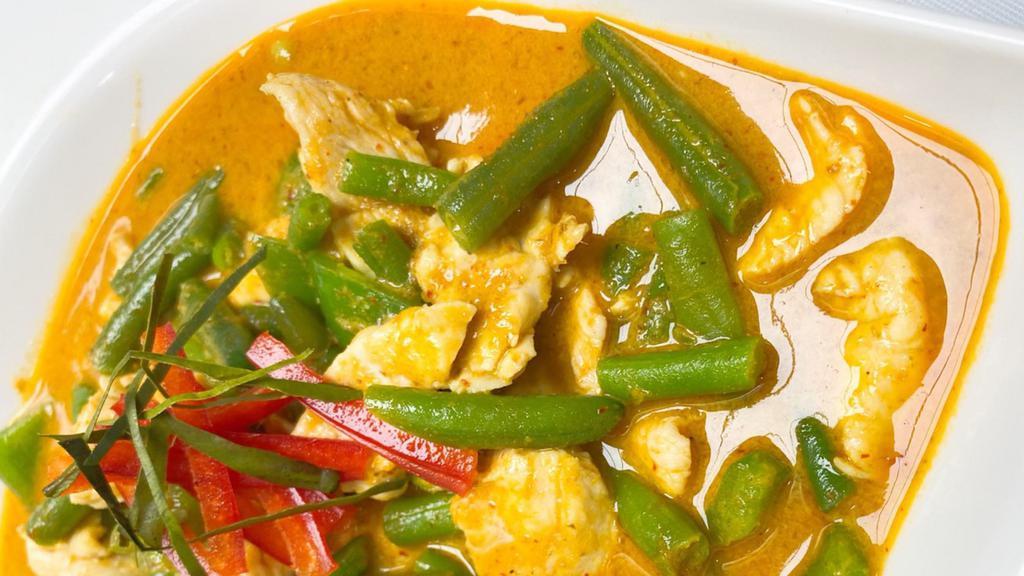 Panang Curry · Spicy. Thai style coconut milk panang curry with peanut, string bean, bell pepper and lime leave.