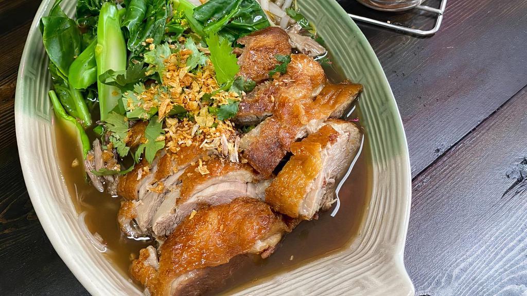 Guay Tiew Ped · Roasted duck with rice noodles, bean sprouts, steamed Chinese kale, scallions.