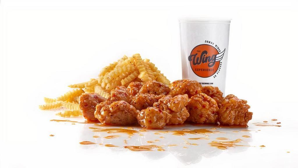 Boneless Wing Combo · Crispy Boneless wings with up to 2 flavors, crinkle cut fries, and a 22oz fountain drink. Featured with our Mango Habanero.