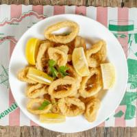 Calamari Fritti (Fried Calamari) · Tender golden fried calamari Served with hot pepper marinara sauce and lemon.