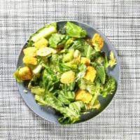 Insalata Di Cesare (Caesar Salad) · Our own special dressing topped with croutons.