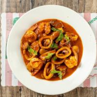 Calamari And Shrimp · Fresh tender squid & shrimp served with either marinara or spicy Fra Diavolo sauce.