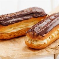 Eclair · Pastry filled with a cream and topped with chocolate icing.