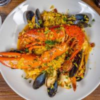 Seafood Paella · Blu Alehouse favorite: Maine lobster, shrimp, mussels, and chorizo sausage; served in a seaf...