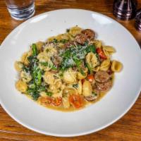 Sausage & Broccoli Rabe · Sweet Italian sausage, broccoli rabe, grape tomatoes tossed in garlic and oil with orecchiet...