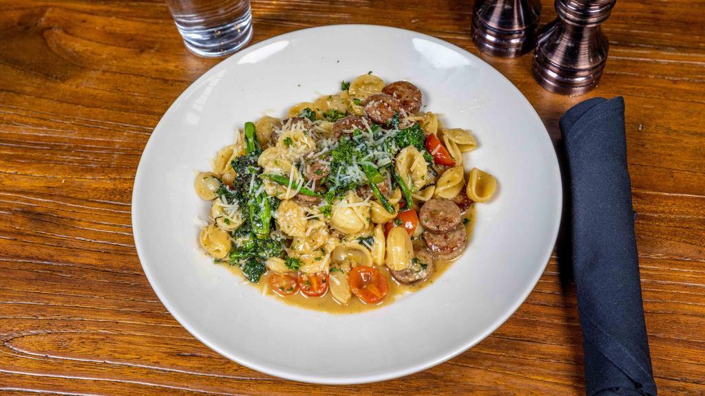 Sausage & Broccoli Rabe · Sweet Italian sausage, broccoli rabe, grape tomatoes tossed in garlic and oil with orecchiette pasta and sprinkled with parmesan cheese.