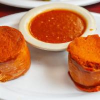 Stuffed Derma (2 Pieces) · Served with brown gravy.