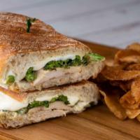 Italian Stallion · With grilled chicken, broccoli rabe, Lioni fresh mozz and garlic aioli. Served with house ma...
