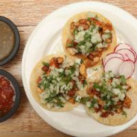 Pollo Taco Taco · All soft tacos served with onion, cilantro.  Crispy tacos served with pico, lettuce and chee...