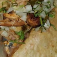 Birria Borrego Taco · Stewed lamb.  All soft tacos served with onion, cilantro.  Crispy tacos served with pico, le...
