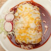 Chimchanga Burrito · Fried burrito, choice of meat with rice and beans. Topped with enchilada sauce and cheese.