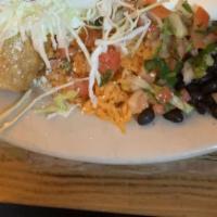 Flautas Plato Tipico · Three deep fried stuffed tortilla, choose one chicken , beef or  cheese, with rice, beans,  ...