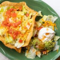 Taco Salad · Choice of ground beef, chicken, shredded beef or pork. Served on a taco shell with fresh let...