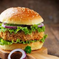 Hot Honey Fried Chicken Breast Sandwich · Delicious sandwich made with perfectly fried Chicken, pickles, and hot honey sauce, served o...
