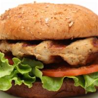 Classic Grilled Chicken Sandwich · Delicious sandwich made with perfectly grilled Chicken, lettuce, tomatoes, and herb mayo, se...