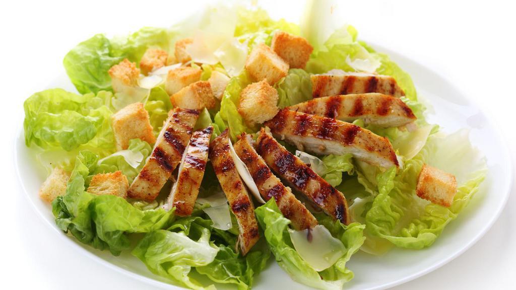 Grilled Chicken Caesar Salad · Refreshing salad prepared with grilled Chicken, romaine lettuce, parmesan cheese, croutons, and Caesar dressing.