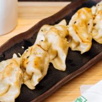 Gyoza (6) · Pan fried pork dumpling