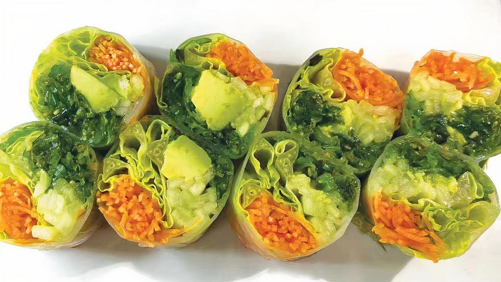 Vegetable Spring Roll · Seaweed salad, carrot, avocado, cucumber, lettuce with rice paper.