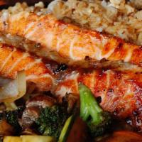Hibachi Salmon Dinner · Full dinner portion fresh made to order, fresh organic salmon teppanyaki sauteed in a sweet ...