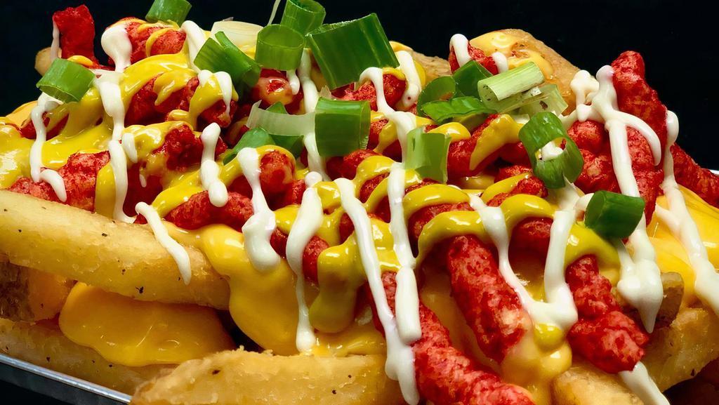Hot Mess Fries · Our fries overloaded with Cheesy Sauce, Smoked-Out Aioli, Spicy Mayo, Bacon Crumbles, Hot Cheetos, and Scallions!