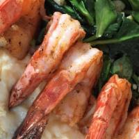 Shrimp & Grits · Wild blackened shrimp, garlicky spinach & parmesan grits.