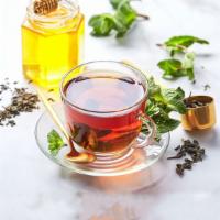 Peppermint Tea · Delicious hot cup of peppermint tea freshly brewed.